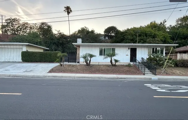 a view of a house with a patio