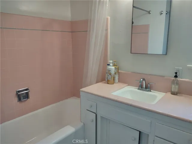 a bathroom with a sink and a bathtub