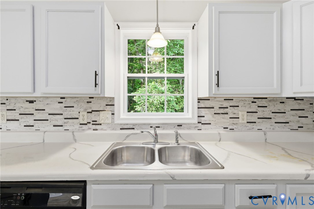 7610 Sugar Run Road Hopewell, VA 23860 - Photo 35 of 48 Kitchen sink area featuring a double-basin stainle
