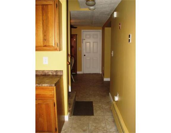 35 Cedar Street, Unit 2 Gardner, MA 01440 - Photo 5 of 9 a view of a bathroom with a door