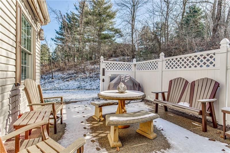 124 Grove Hill Road Baden, PA 15005 - Photo 22 of 25 18x14 rear patio with a retractable awning provides a wonderful place to relax and enjoy the outdoors.