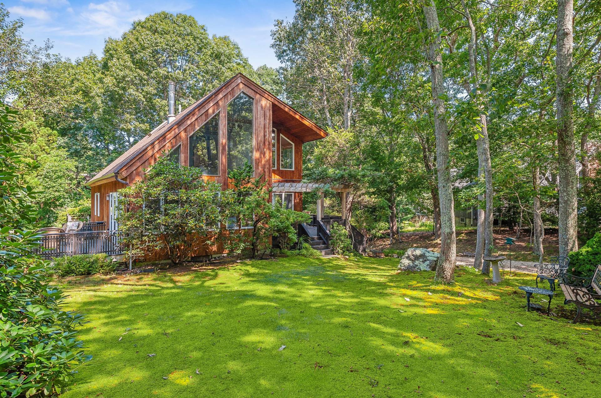 6 Eli Circle East Hampton, NY 11937 - Photo 1 of 29 a view of a house with backyard and garden