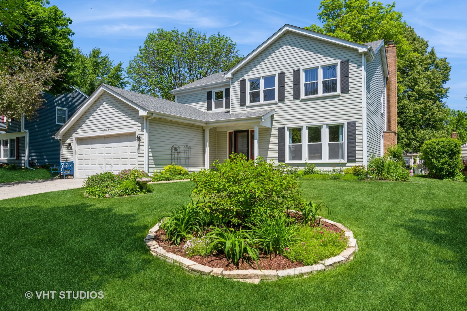 2272 Pontiac Circle Naperville, IL 60565 - Photo 1 of 14 a front view of a house with a yard