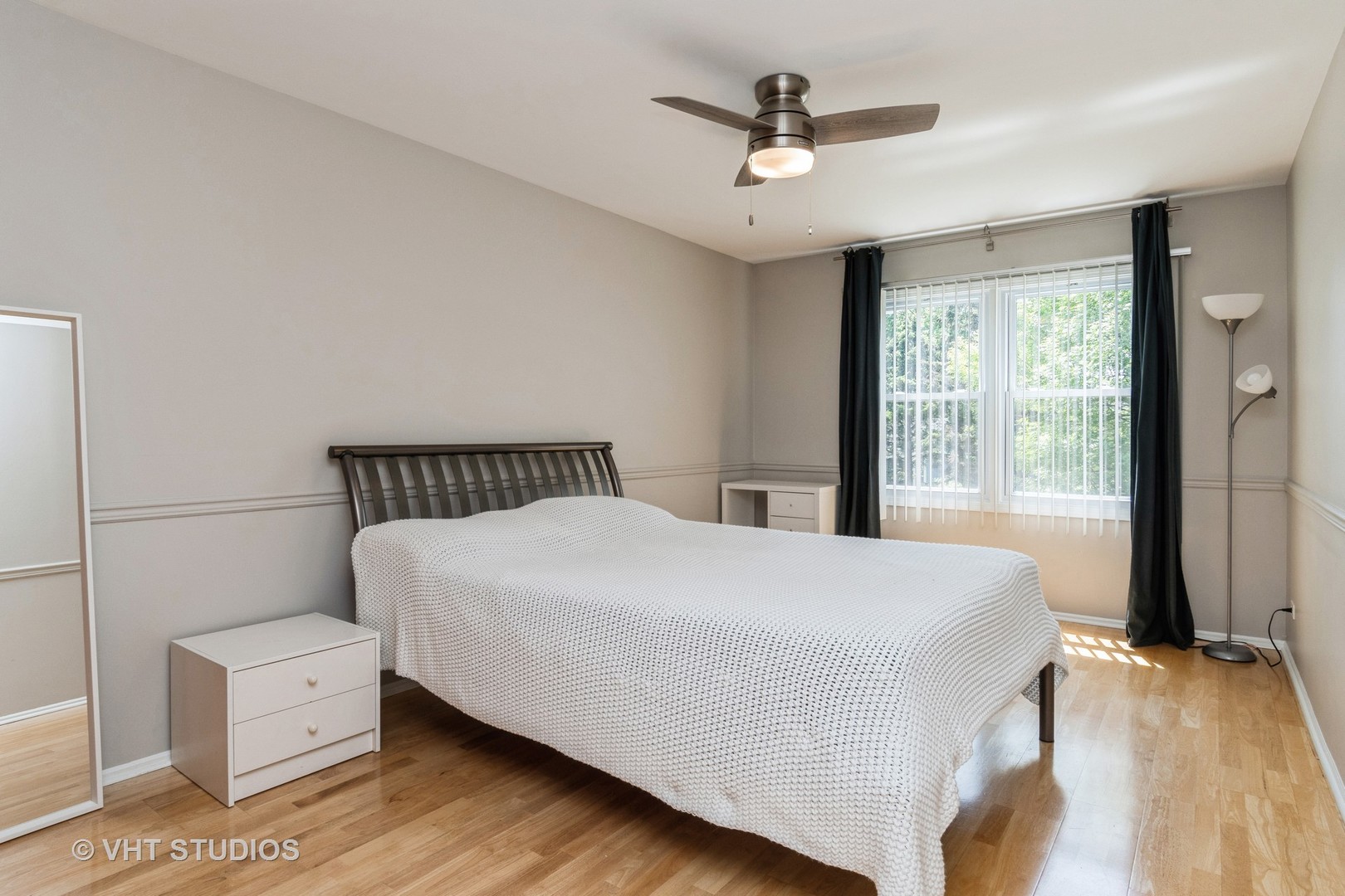 2272 Pontiac Circle Naperville, IL 60565 - Photo 8 of 14 a bedroom with a large bed and a large window