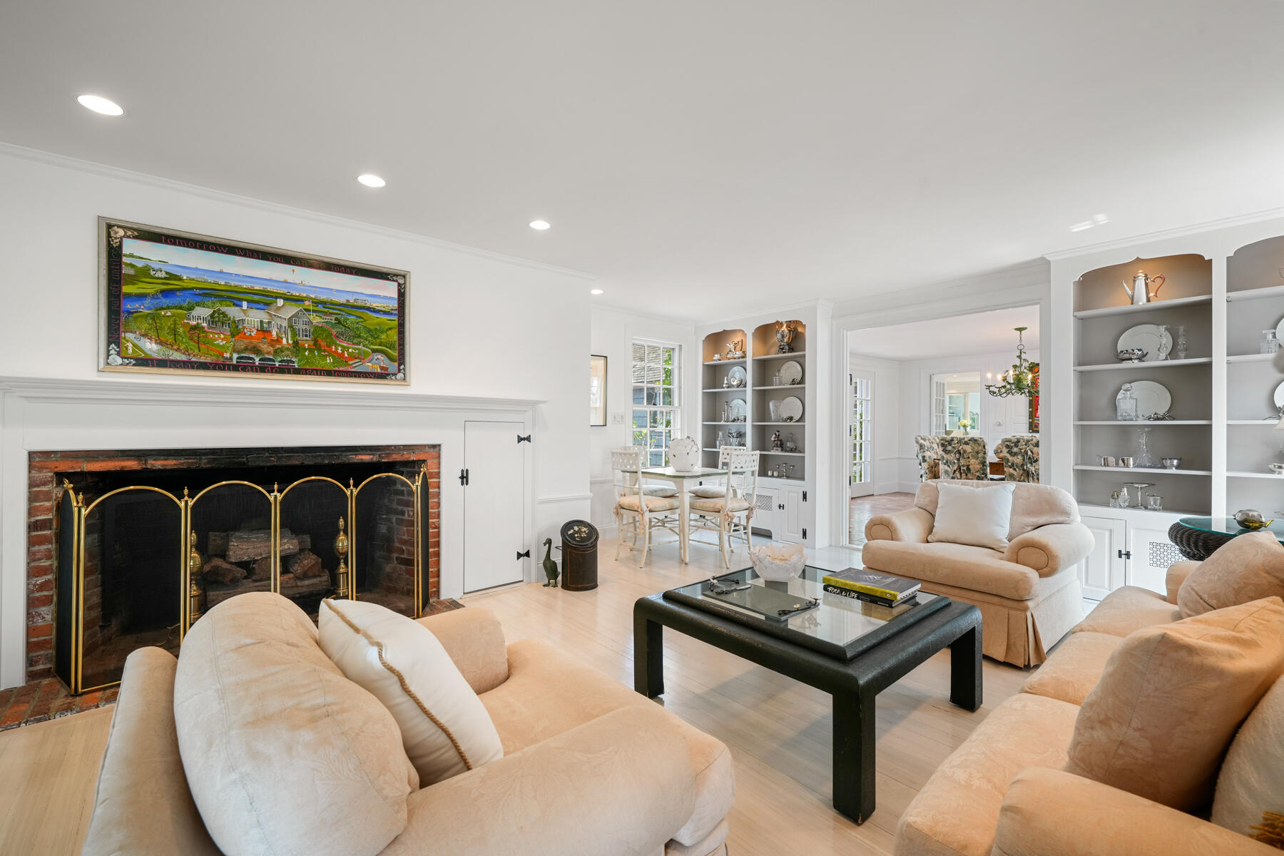 68 Waterman Farm Road Centerville, MA 02632 - Photo 22 of 47 a living room with furniture and a fireplace