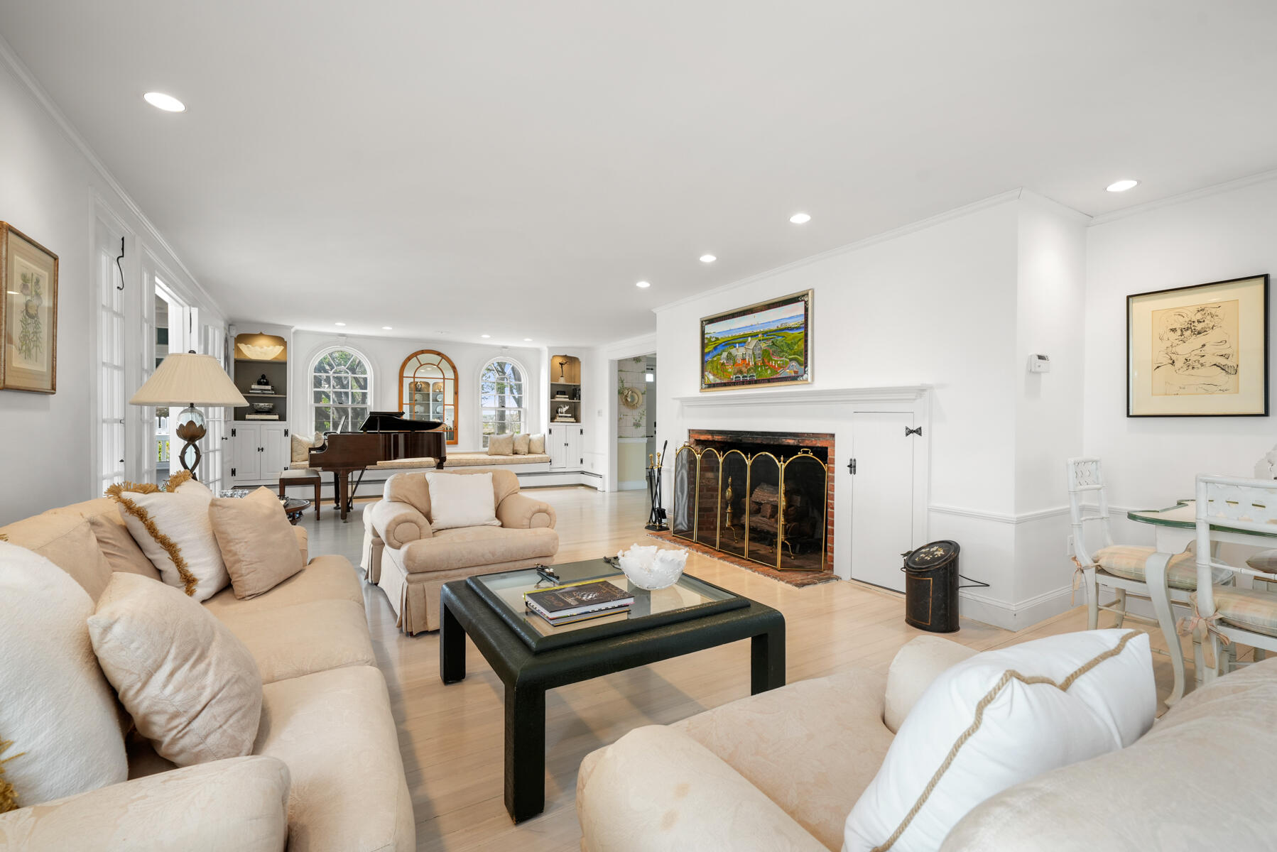 68 Waterman Farm Road Centerville, MA 02632 - Photo 23 of 47 a living room with furniture and a fireplace