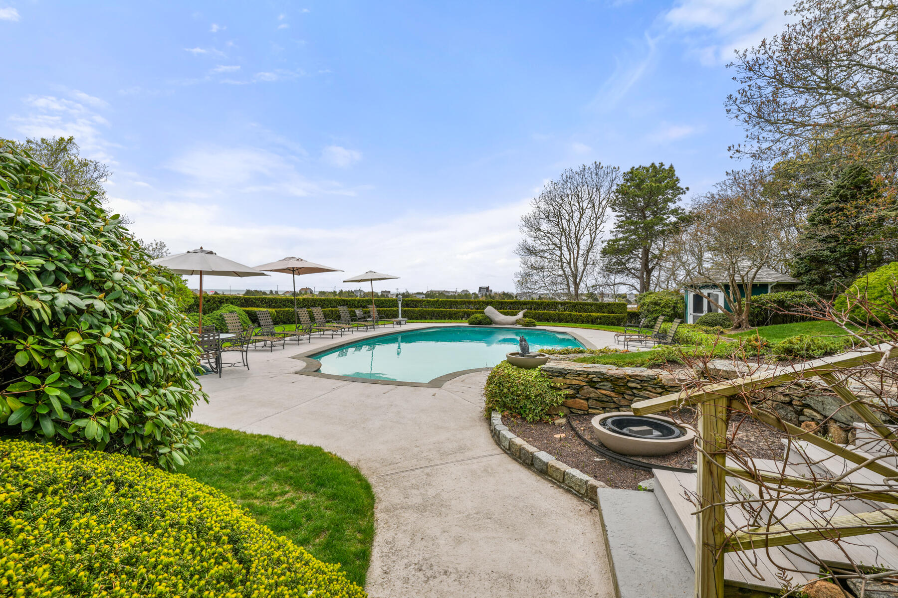 68 Waterman Farm Road Centerville, MA 02632 - Photo 41 of 47 a view of a swimming pool and a yard