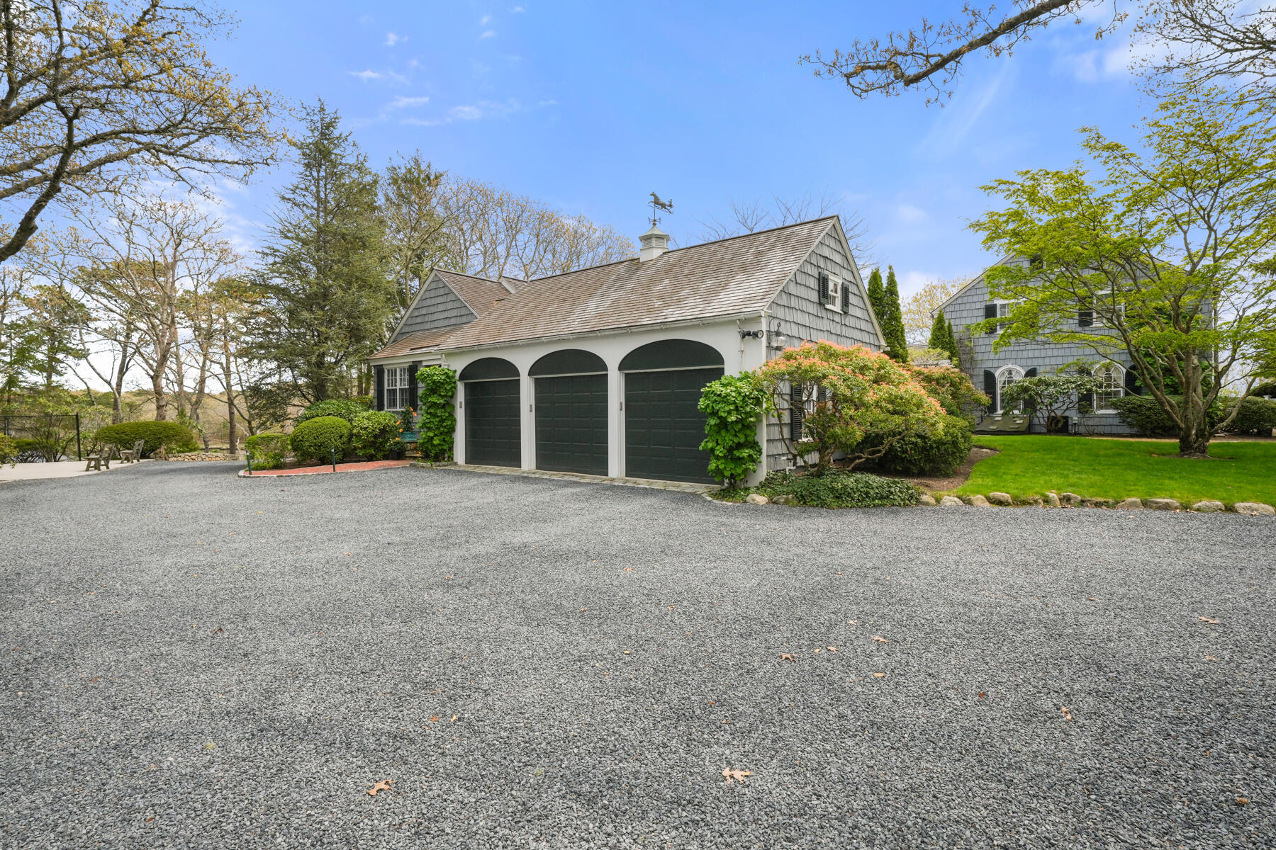 68 Waterman Farm Road Centerville, MA 02632 - Photo 44 of 47 a view of a house with a yard and large trees