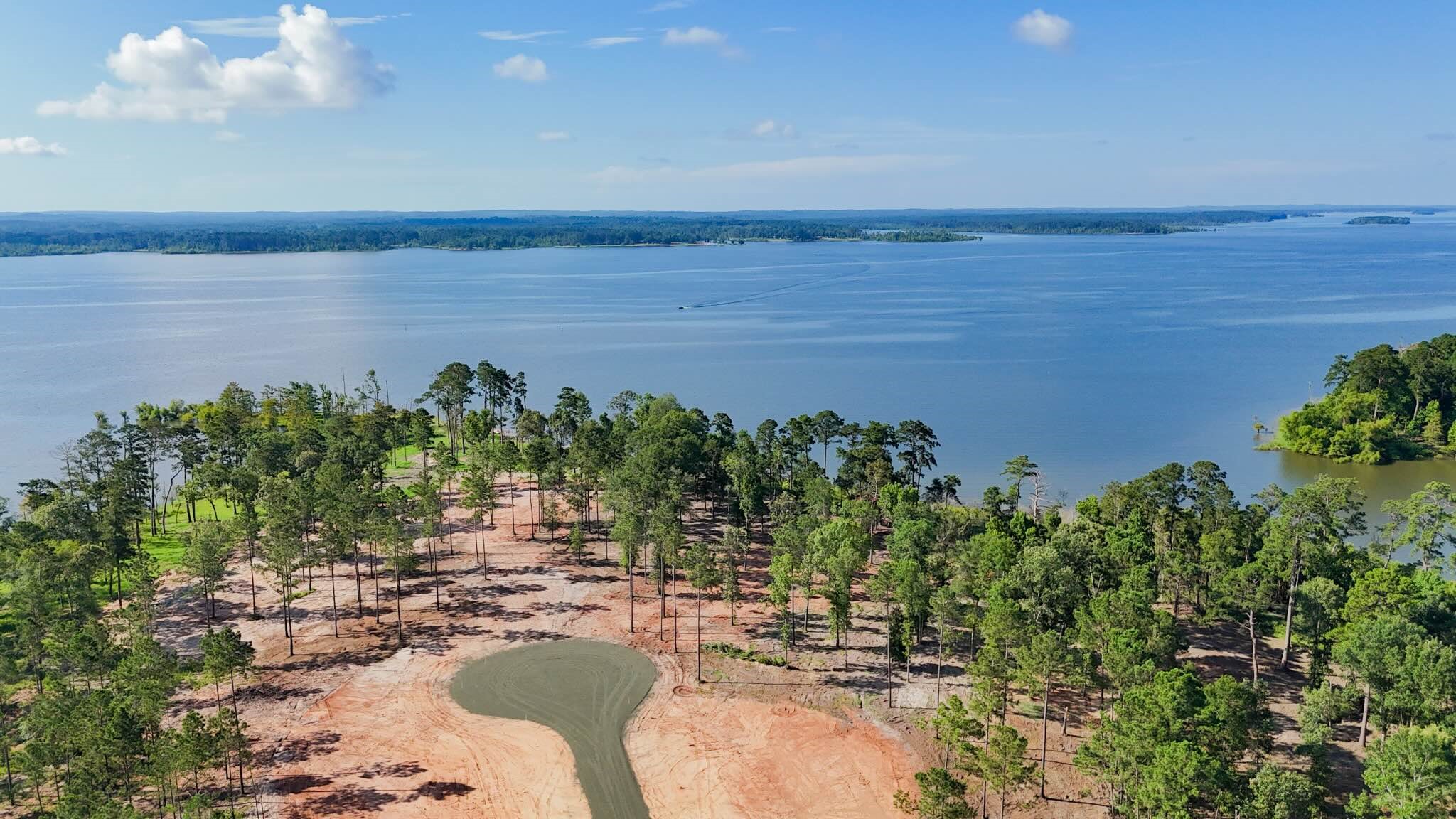 253 Debbie Lane Bronson, TX 75930 - Photo 7 of 17 a view of a lake with a yard