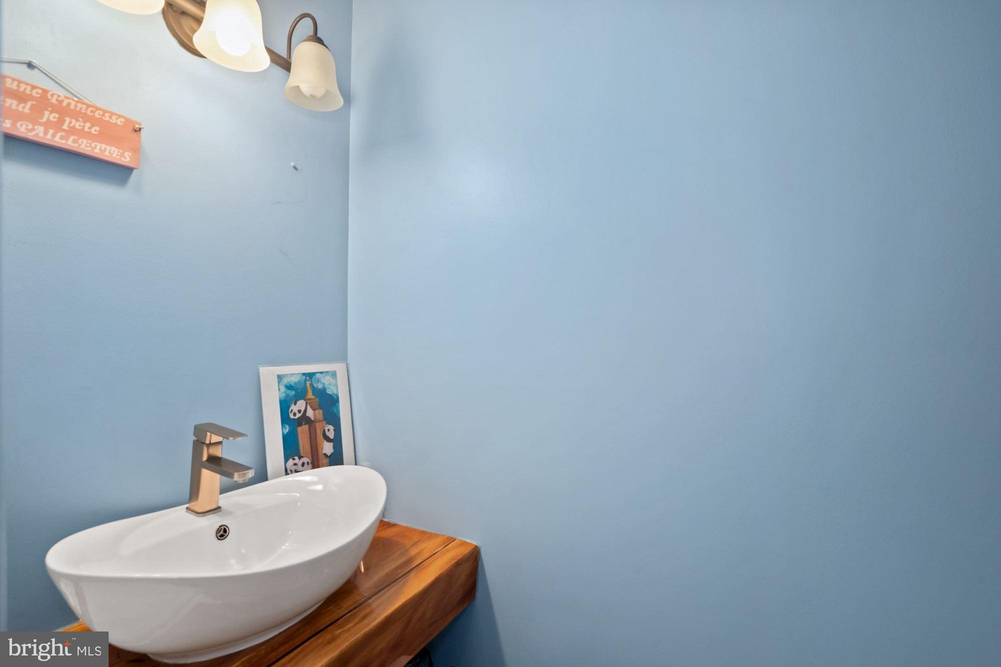 89 Catoctin Court Silver Spring, MD 20906 - Photo 13 of 29 Powder Room next to Foyer