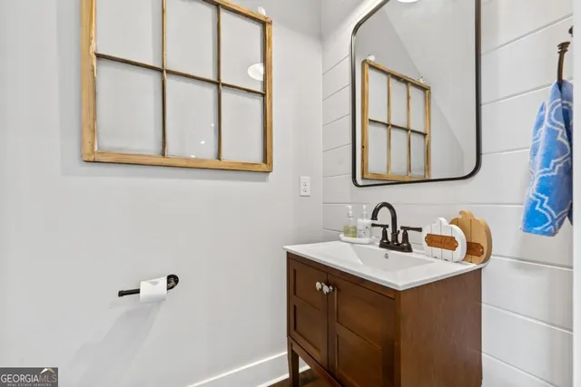 a view of a dining room with furniture wooden floor and a chandelier