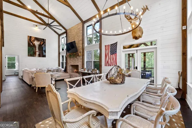 a kitchen with stainless steel appliances granite countertop a sink and a window