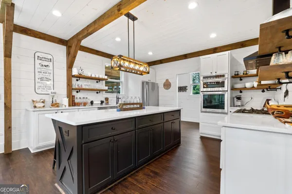 a storage room with washer and dryer