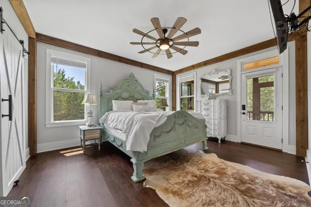 a view of swimming pool with seating area