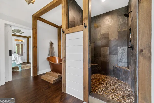 a bathroom with a double vanity sink and a mirror