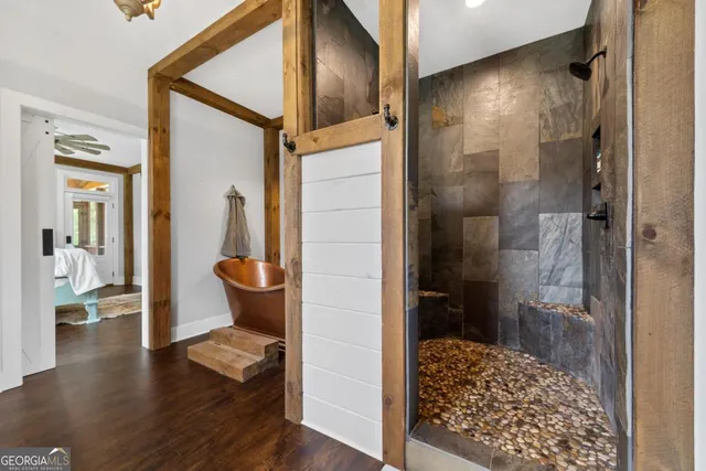 a bathroom with a double vanity sink and a mirror