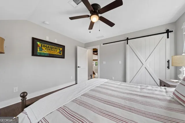 a bathroom with a sink a vanity and a mirror