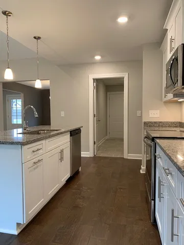 a large kitchen with cabinets