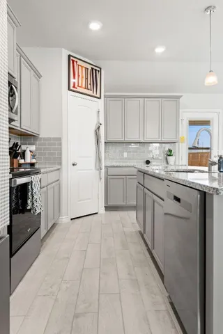 a view of kitchen with dining table and chairs