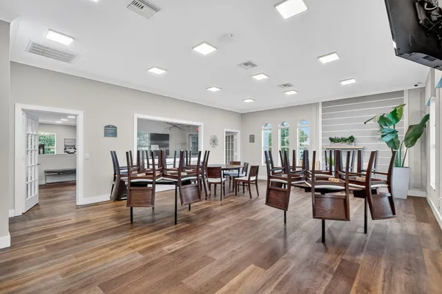a view of swimming pool with a yard and outdoor seating