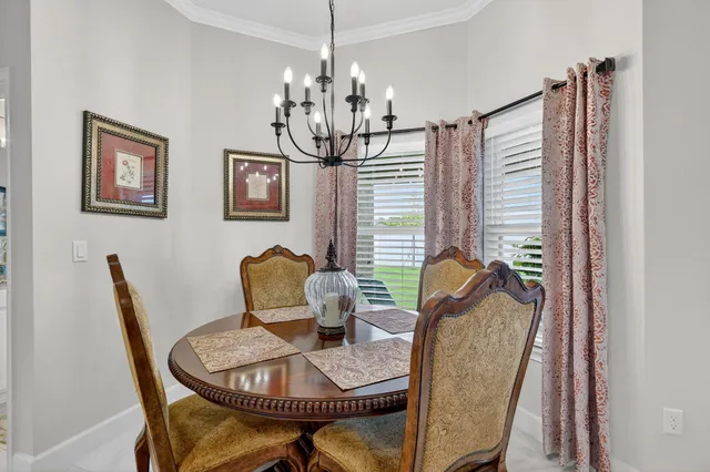 a bedroom with a bed and chair