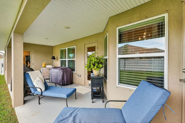 an aerial view of a house with a garden