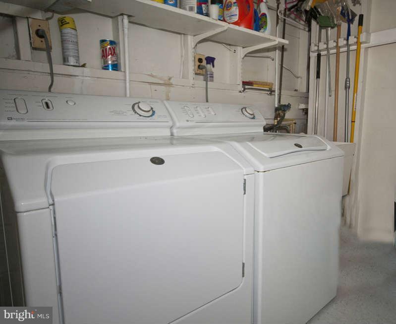8119 Scotts Level Road Baltimore, MD 21208 - Photo 20 of 24 a utility room with dryer and washer