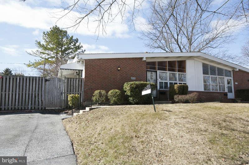 8119 Scotts Level Road Baltimore, MD 21208 - Photo 21 of 24 a view of a house with a yard