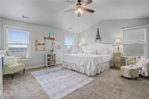 a bedroom with a bed and furniture
