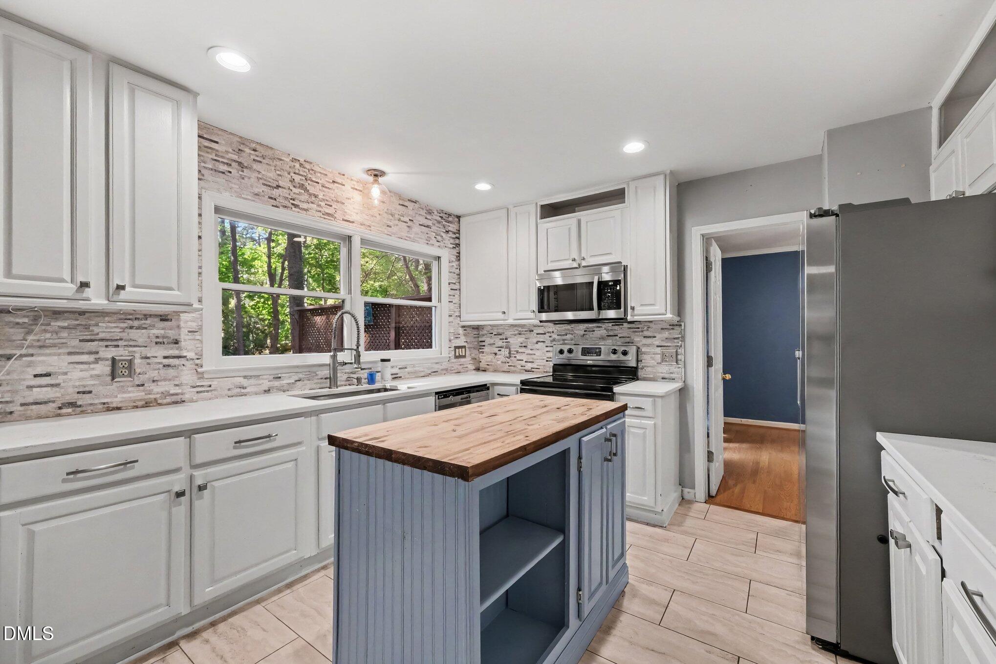 1204 Belhaven Road Cary, NC 27513 - Photo 9 of 32 Large Main Kitchen