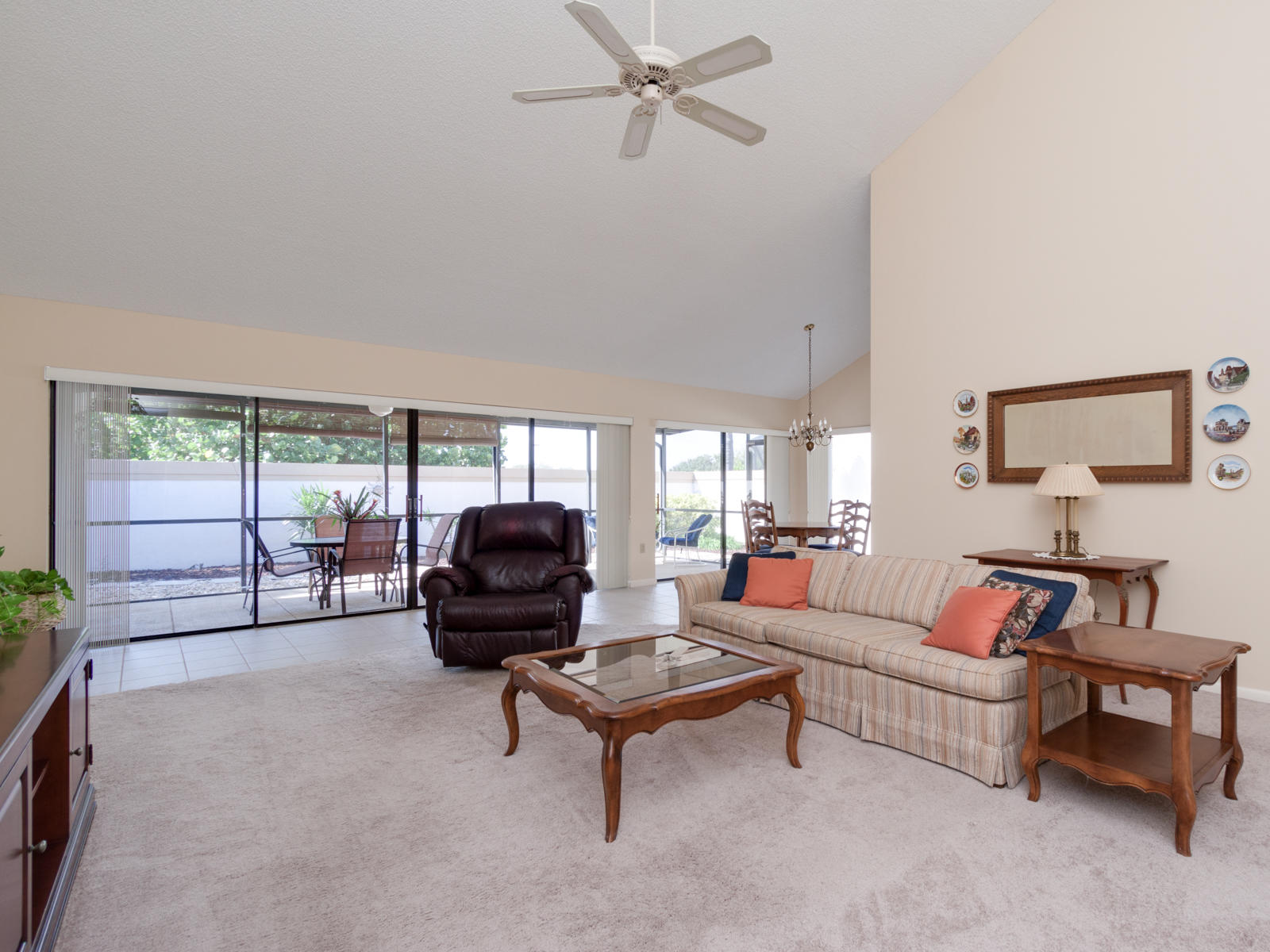 186 Ridge Road Jupiter, FL 33477 - Photo 5 of 44 a living room with furniture and a large window