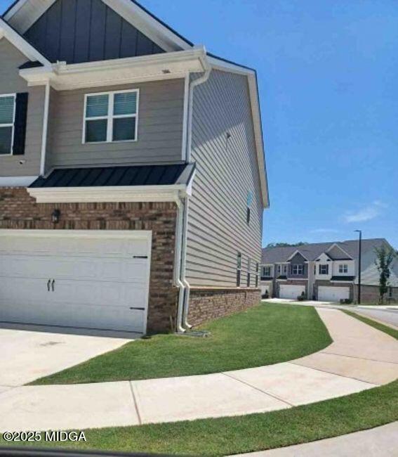 179 Hampton Street McDonough, GA 30253 - Photo 2 of 2 a view of a house with a yard