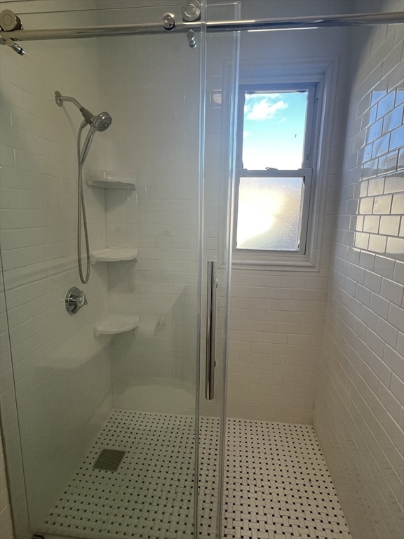 26 Chiswick Road, Unit 13 Boston, MA 02135 - Photo 11 of 19 a bathroom with a shower