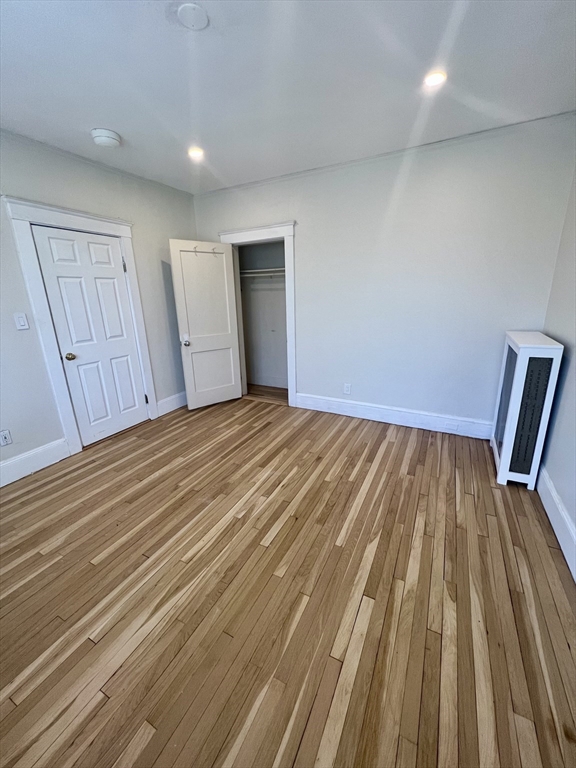 26 Chiswick Road, Unit 13 Boston, MA 02135 - Photo 18 of 19 a view of wooden floor in an empty room