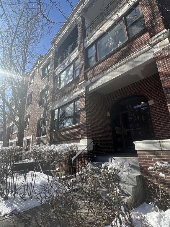 26 Chiswick Road, Unit 13 Boston, MA 02135 - Photo 2 of 19 a view of a house with a yard