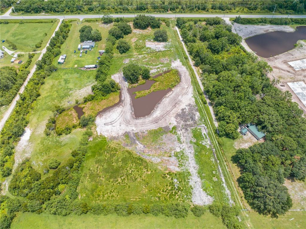 5420 Holopaw Road St. Cloud, FL 34773 - Photo 9 of 16 a view of a garden with a lake