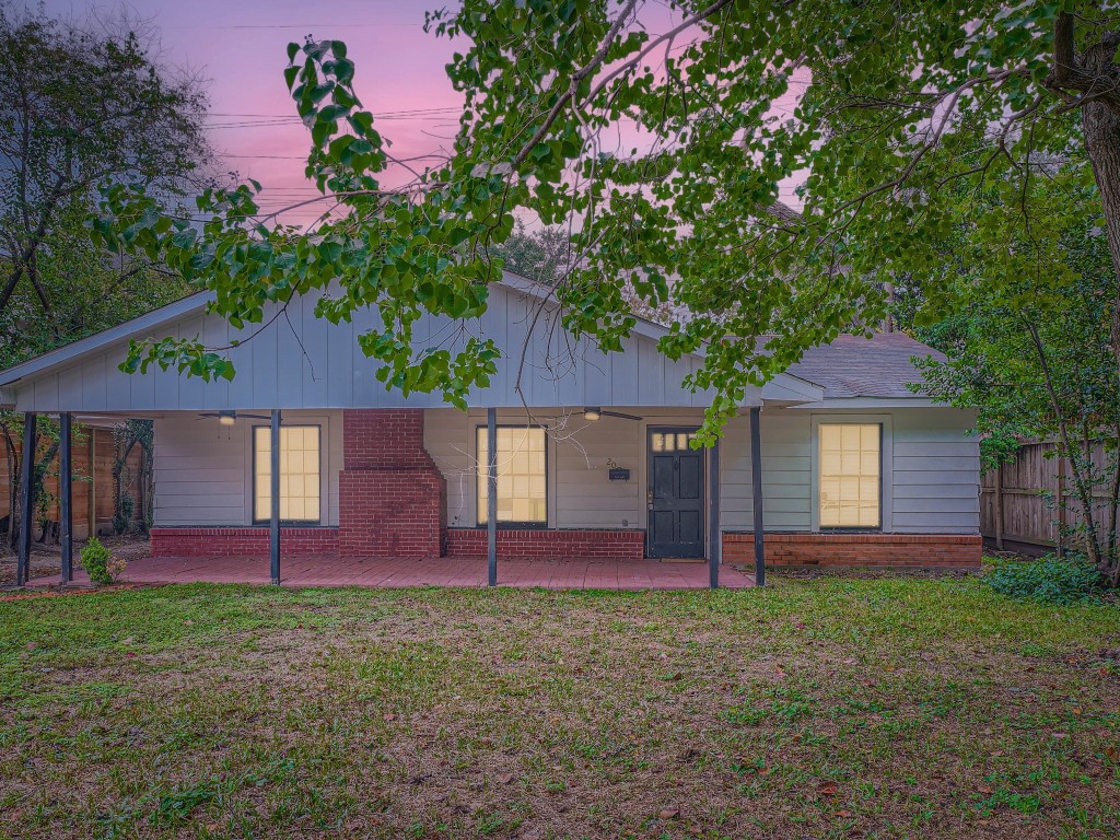 20 Hackberry Lane Houston, TX 77027 - Photo 1 of 1 a front view of a house with a yard
