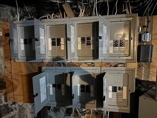a view of a kitchen with stainless steel appliances granite countertop a sink and a stove