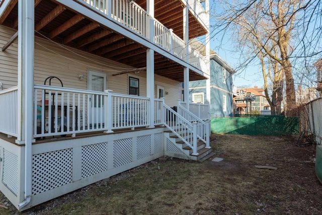 a view of a chair with a small yard