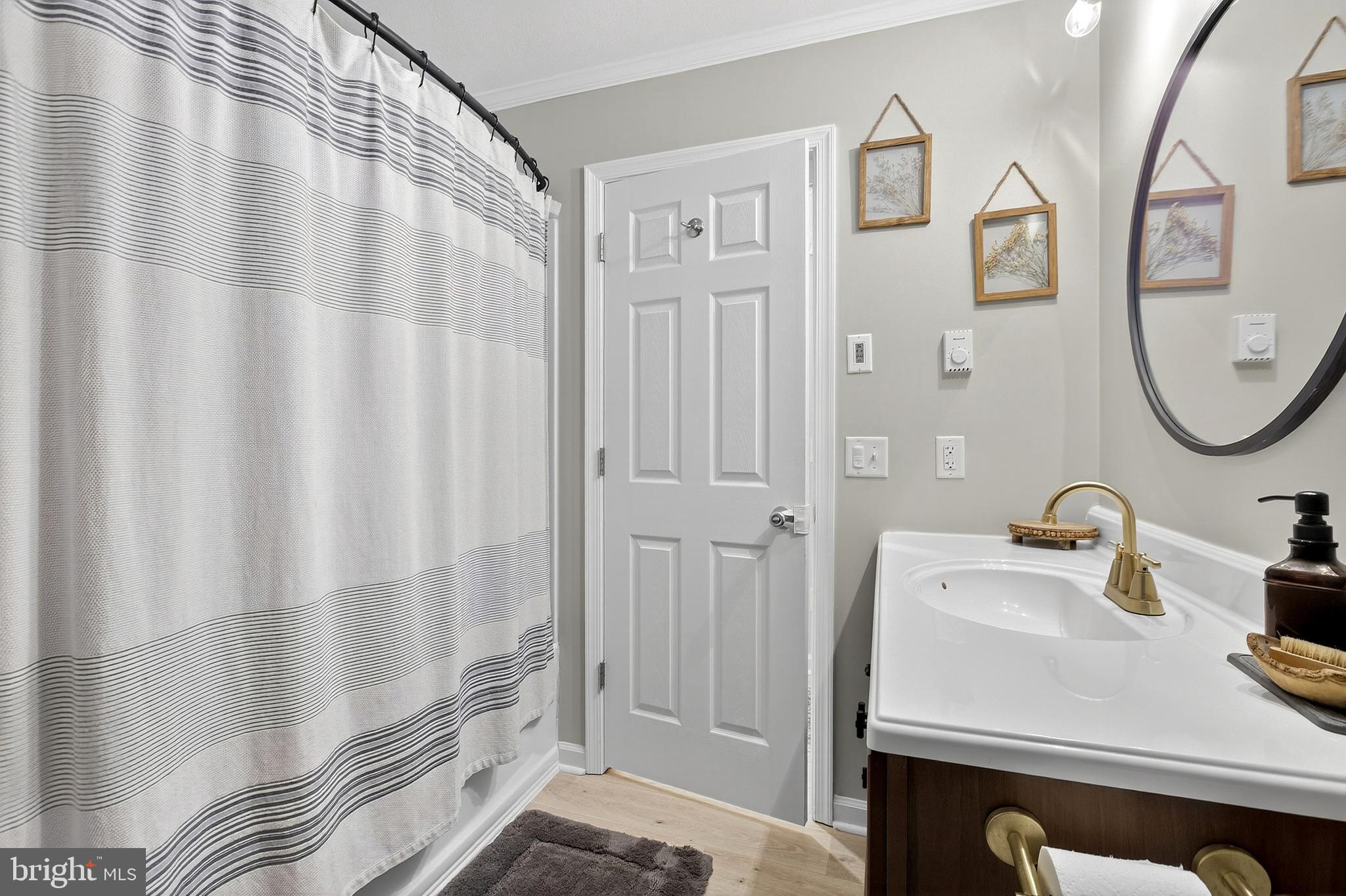 902 Vandyke Greenspring Road Townsend, DE 19734 - Photo 32 of 47 a bathroom with a sink a toilet and a mirror
