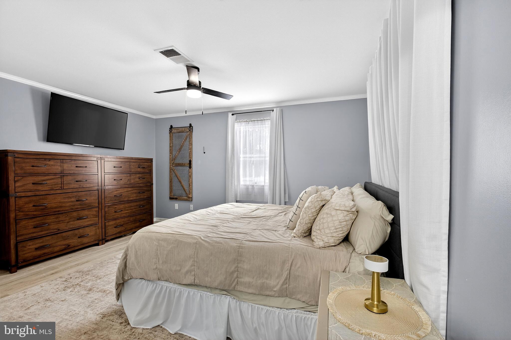 902 Vandyke Greenspring Road Townsend, DE 19734 - Photo 35 of 47 a bedroom with a bed and a closet