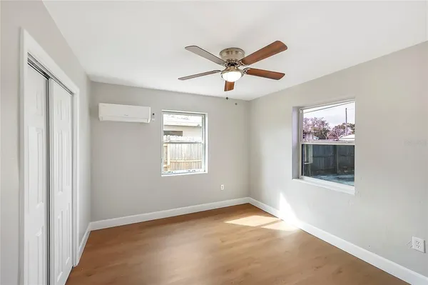 a view of an empty room with a window
