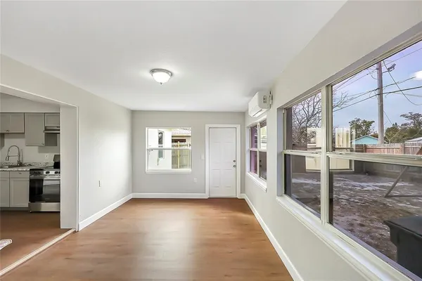 an empty room with windows