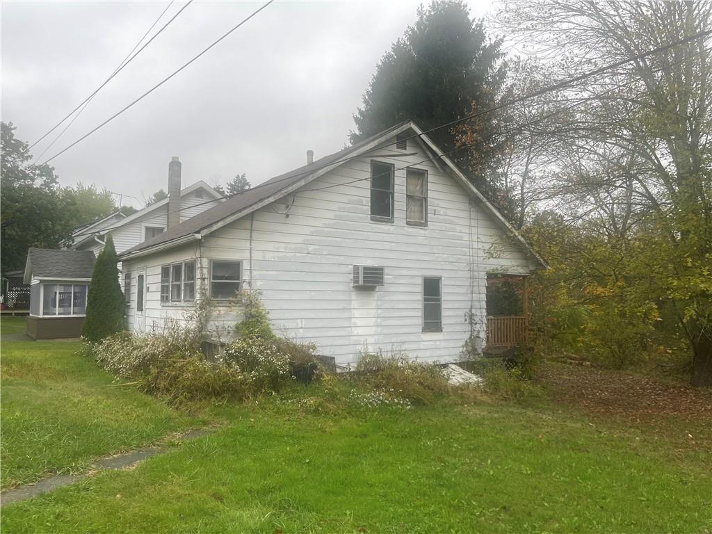 105 Mohawk Street Bruin, PA 16022 - Photo 2 of 16 a house view with a garden space