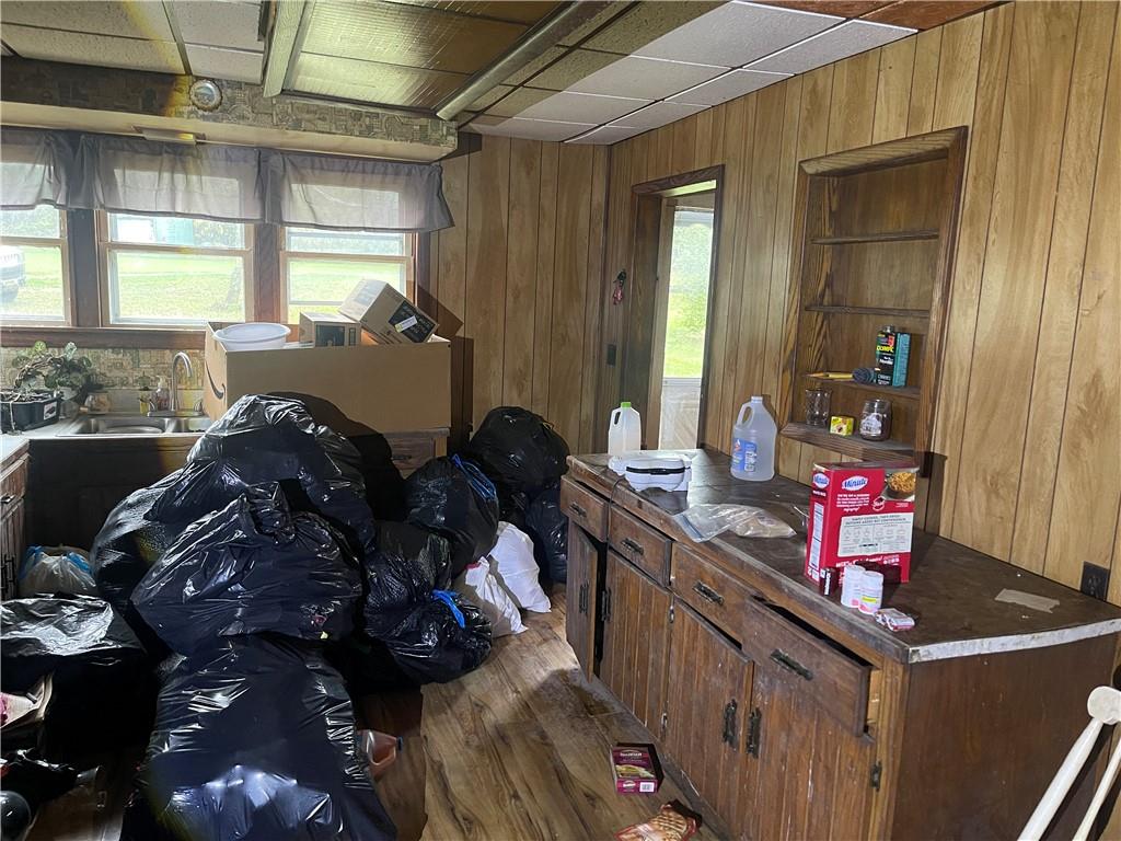 105 Mohawk Street Bruin, PA 16022 - Photo 10 of 16 a kitchen with a sink stove and cabinets