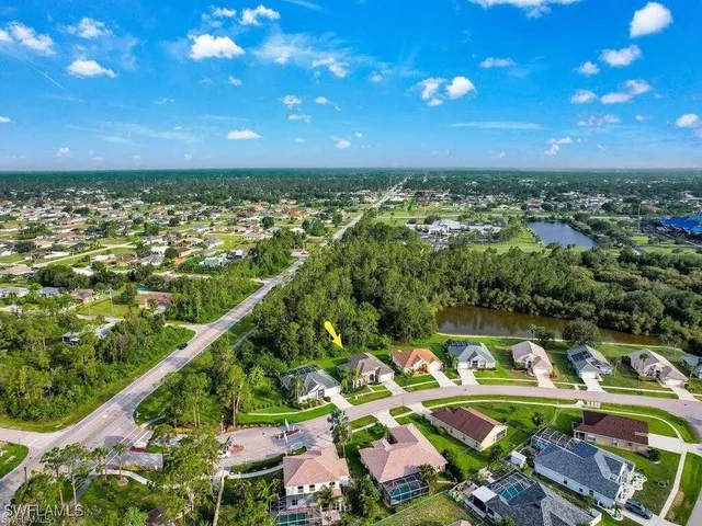 a view of a city with lots of residential buildings swimming pool and outdoor space