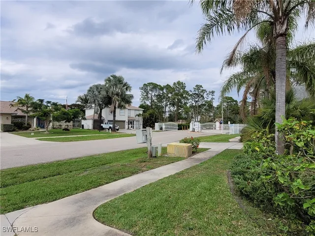 a view of a swimming pool with a garden