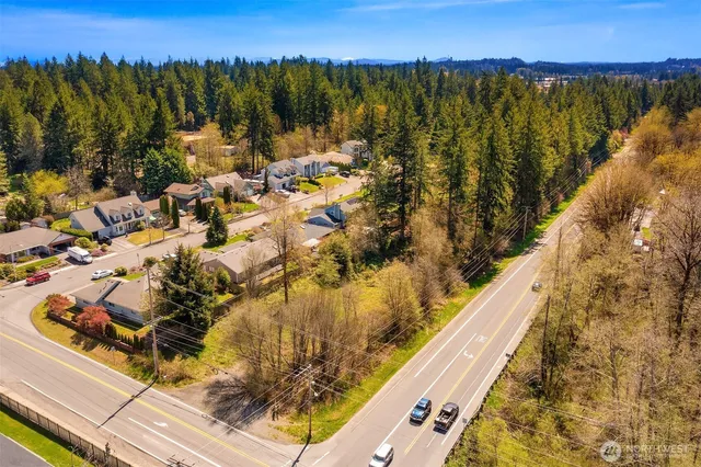 a view of residential houses with swimming pool