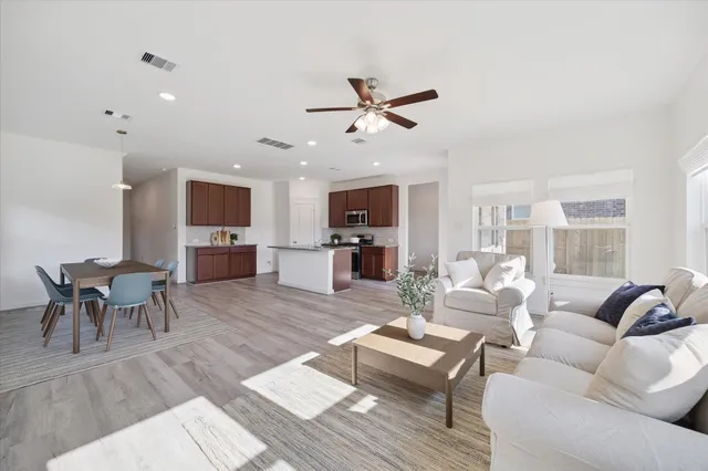 a living room with furniture or outdoor view and a fireplace