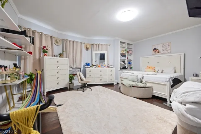 a bed room with a bed and a couch